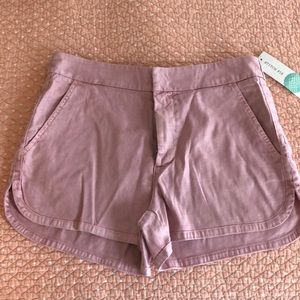 Level 99 andriana tulip hem short. Light pink